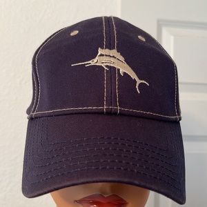 TOMMY BAHAMA MARLIN BALL CAP. Denim blue with beige stitching. Embroidered